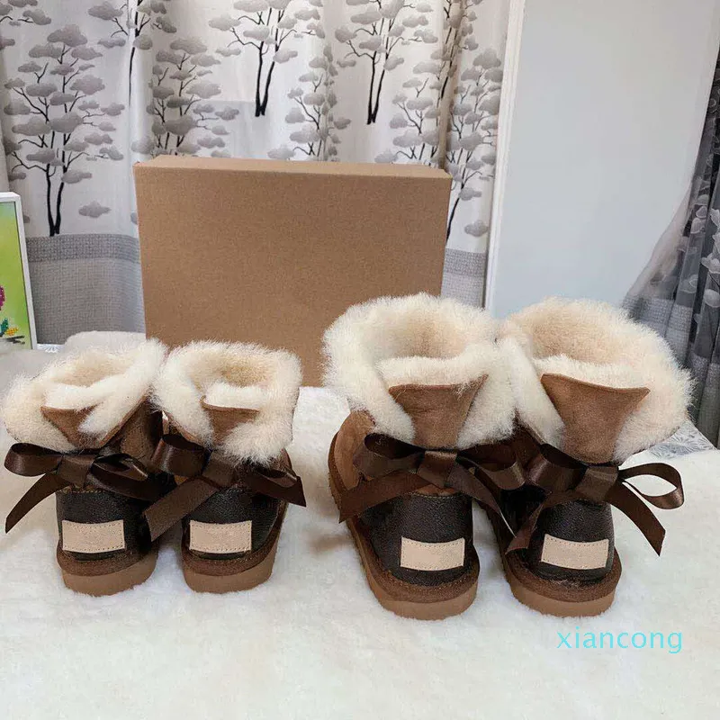 Designer- Bottes de neige d'hiver pour femmes et enfants en cuir de vache fendu femmes garçons filles enfants bébé chaussures à nœud chaud