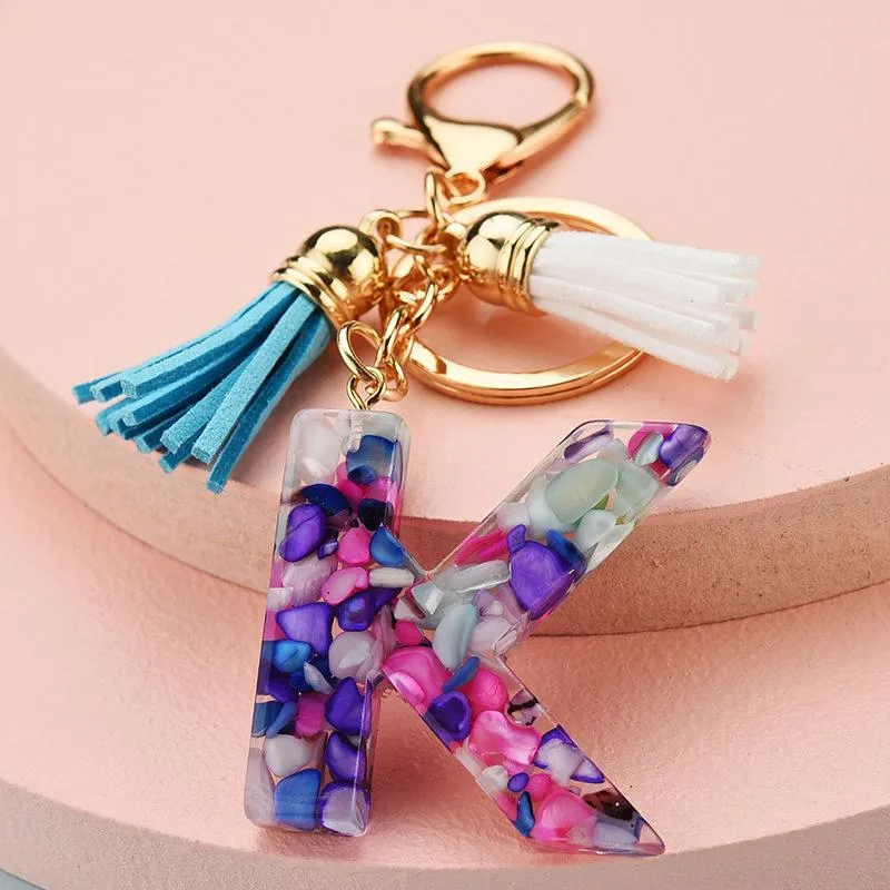 Initial keychain with tassel on sale