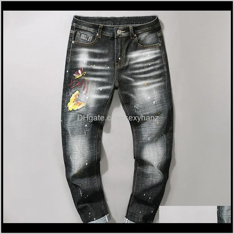 trend new embroidery yellow butterfly spray paint wave point slim tight straight men`s jeans hole trousers