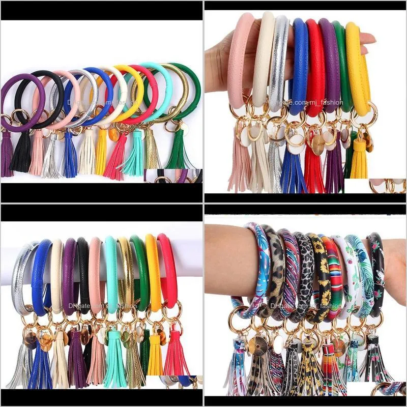 big customer discount pu leather tassel sunflower bracelet keychain leopard sunflower cactus round leather tassel bangle key ring 2257