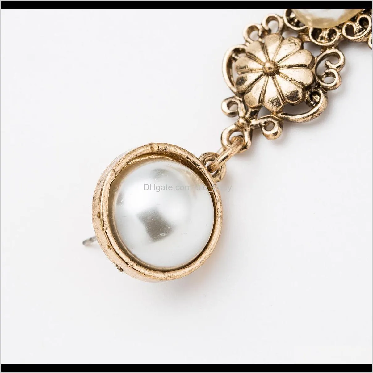 exaggerated alloy cross flower imitation pearl earrings women`s high-end court wind earrings fashion versatile