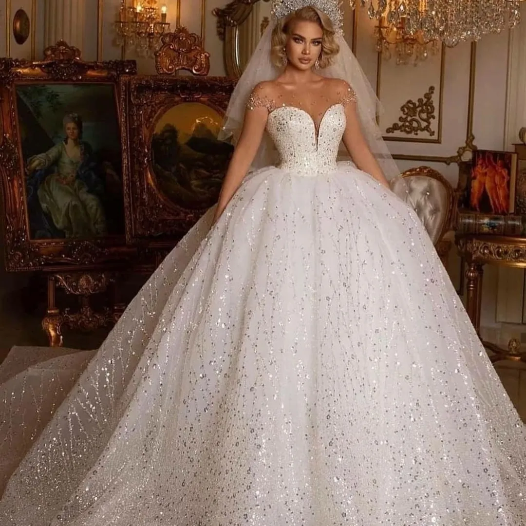 Stunning Sequined Ball Gown Wedding Dresses Elegant Sheer Neckline - Main Image