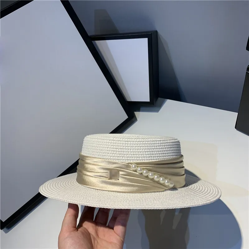 女性のための屋外のビーチのわらの太陽の帽子のための夏の旅行休暇休暇の帽子パールフラットトップワイドブリムキャップ