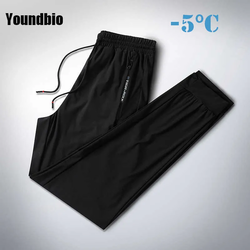 Pantalones de chándal de seda de hielo de verano para hombre de secado rápido, transpirables, holgados, con cinturón, rectos, ajustados, elásticos, informales, para hombre, 7XL 210707