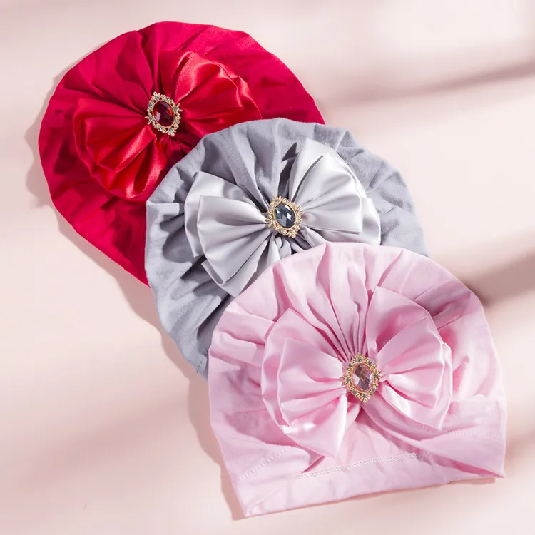 Barn keps tillbehör nyfödda toddler barn baby pojke tjej turban bomull beanie hatt vinter varm mjuka india kepsar solida båge rhinestone wrap hattar m3509