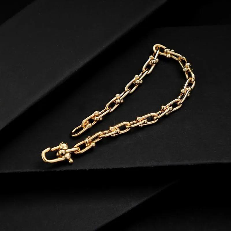 Länkarmbandkedja ringspänne armband koppar pläterade 18k guld smycken lyxstruktur online kändis272r
