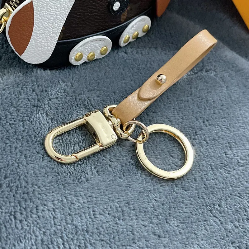 Keychains Lanyards 21SS myntväskan Keychains nyckelringar med låda Luxury Leather Dog Style Små väskor Pendant Bilkedjor Buckle Keychain Letter Top Quality Women Bag AC AC AC
