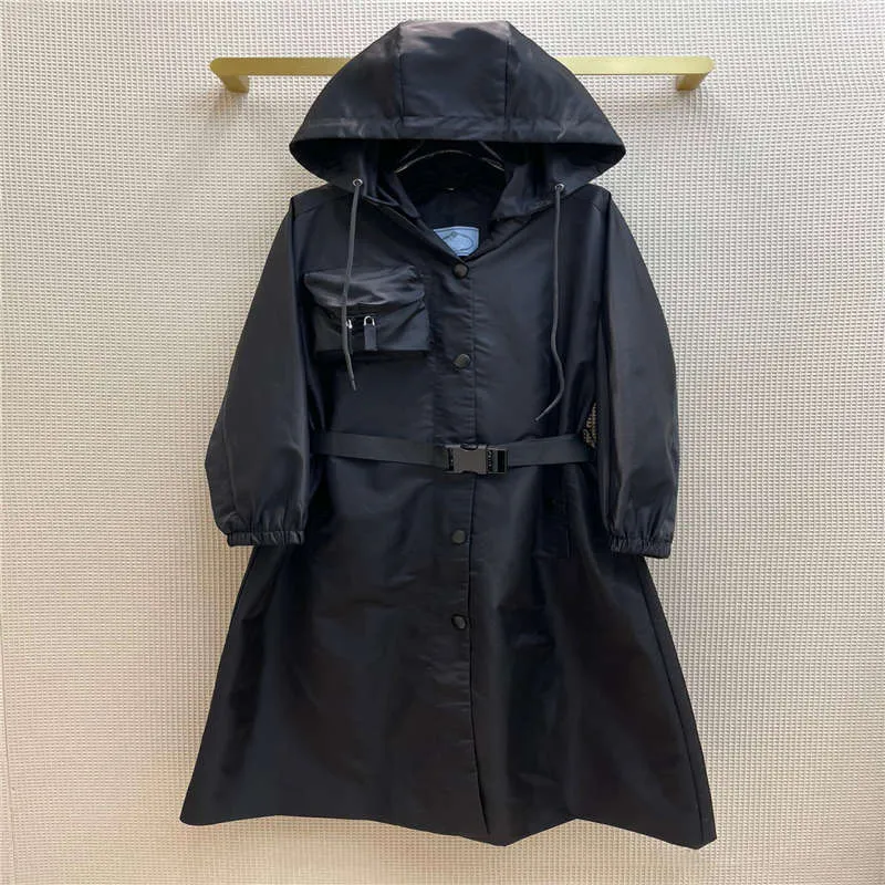 21SS FW Kvinnor Jackor Trench Coats Letter Symbol Hooded Elastisk Midja Med Bälte Högkvalitativa Mode Jackor Storlek S-L