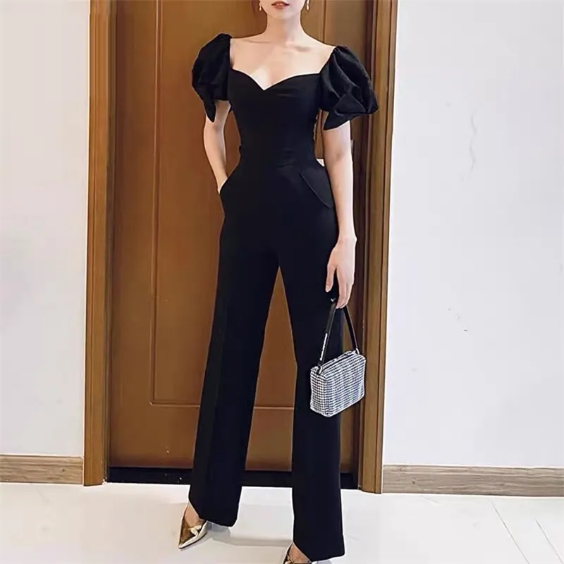 Högkvalitativ mode Eleganta Kvinnor Jumpsuits Sexig Strapless Puff Short Sleeve Midja Slim Black Jumpsuit 210520