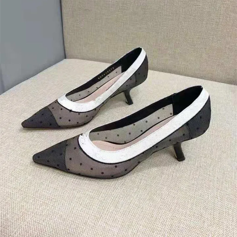Nuovo sandalo da donna 23ss Gladiatore scarpe con tacco in pelle fondo piatto marchio di moda sexy lettera panno sandali da donna tacchi