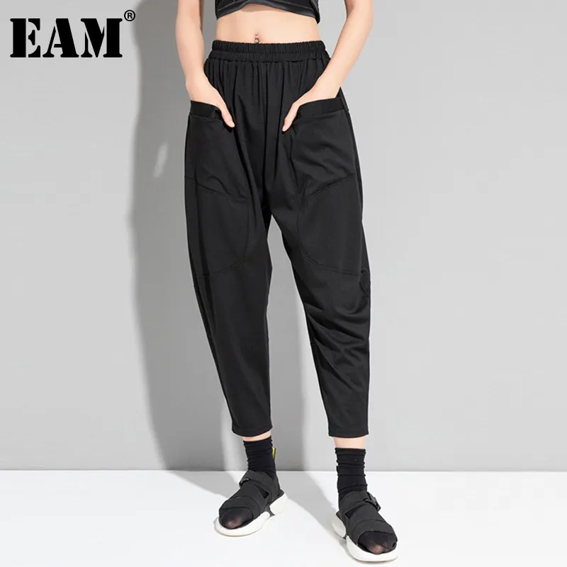 [EAM] Schwarze Taschen Gespleißte Elastische Taille Hose Lose Fit Harem Wadenlange Hosen Frauen Mode Frühling Sommer 210512