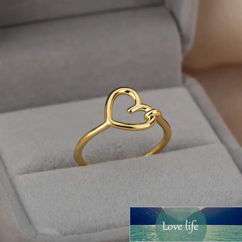 Rinhooステンレススチール製オパールムーンリング女性男性の中空愛の心ゴールドカラーデイジー蓮の蜂の指輪の結婚式のジュエリー工場価格専門のデザイン品質