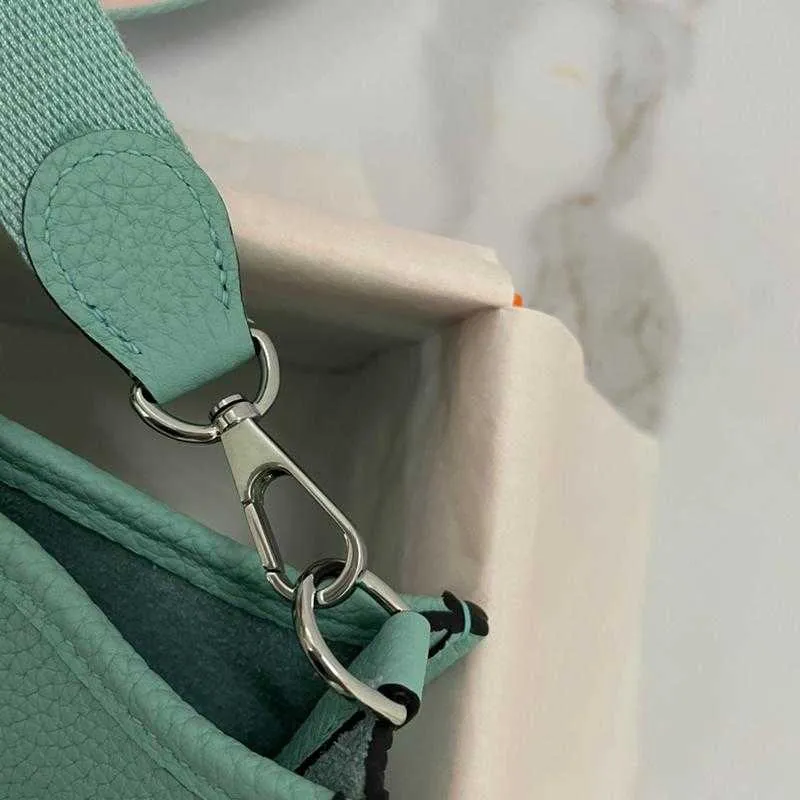 Summer European and American original first layer bag fashion personality design shoulder messenger hollow bucket female tide 2021