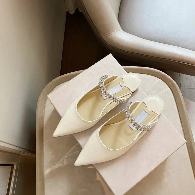 Bing embellished leather-trimmed flats