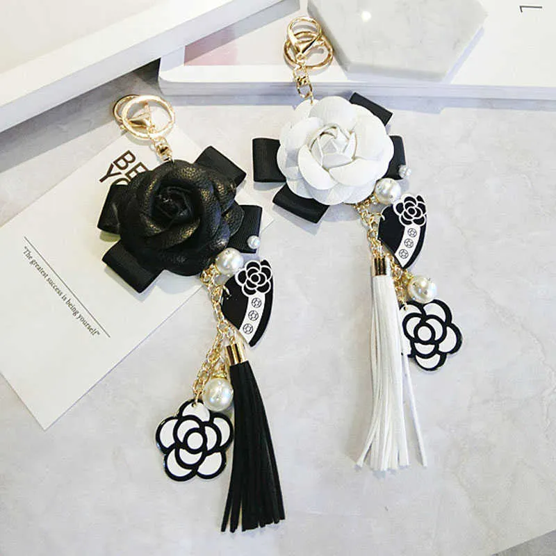 Luxe tas zwart wit vrouw sleutelhanger pluche auto camellia tassen sleutelhanger G1019