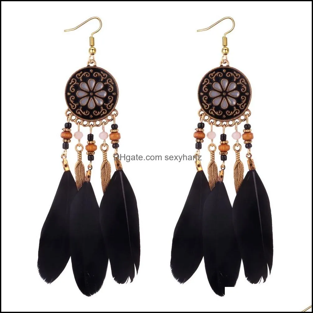 Autumn and winter earrings bohemian retro personality feather tassel earrings female long exaggerated ethnic style earrings