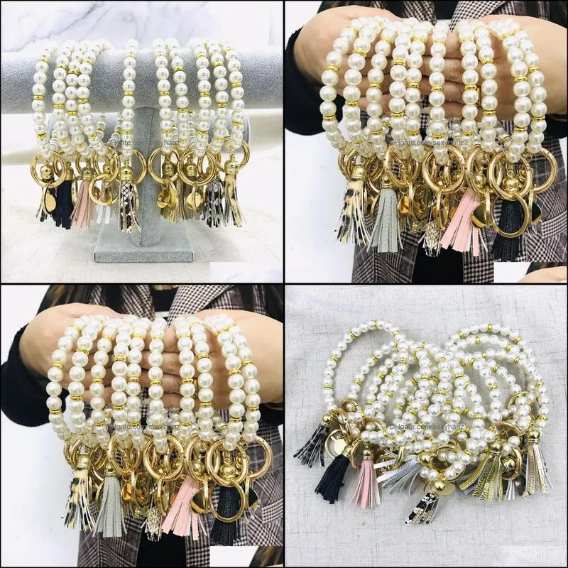 Best Seller Elegant Personalized Metal Disc Charm Pearl Bangle Keyring Handmade Fashionable Faux Pearl Leather Tassel Bracelet