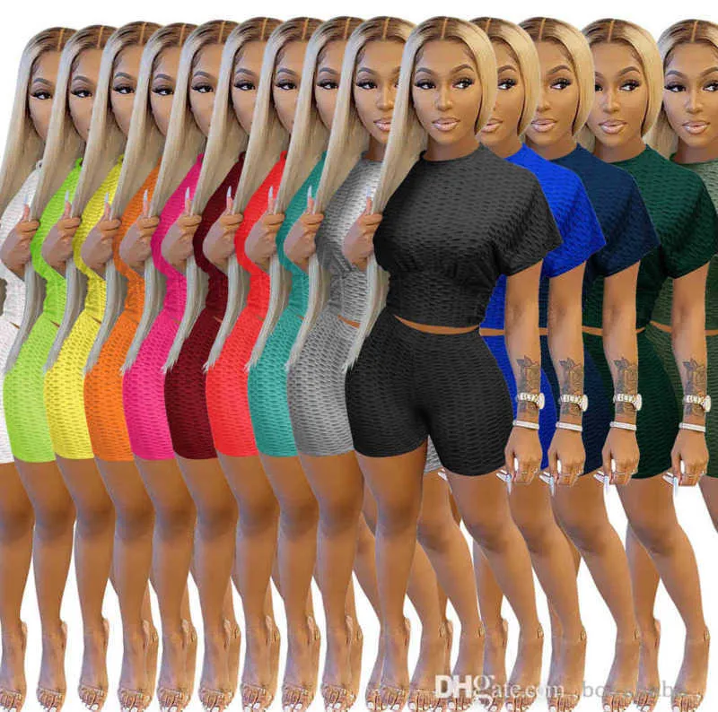 Diseñador Mujer Chándales deportivos Verano Color sólido Jacquard Camiseta de manga corta Pantalones cortos Pantalones de dos piezas Trajes de yoga Trajes de jogging de moda