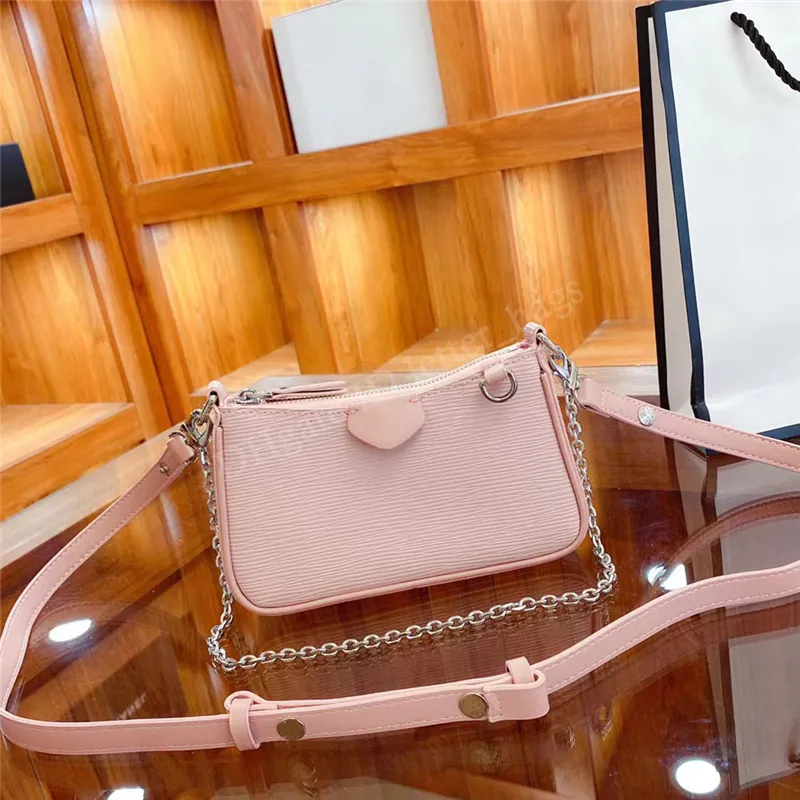 Tasarımcılar çanta çanta omuz zinciri crossbody çanta cüzdanları tote debriyaj mektupları su dalgalanması kare sade fermuarlı çift kayışlar kadınlar lüks çanta çantası