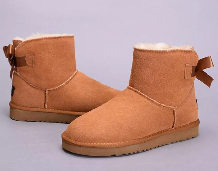 2022 venda quente aus u5062 tornozelo 1 arco botas de neve femininas bowknot manter quente botas de pele de carneiro de couro genuíno presentes de aniversário de natal u50g62g