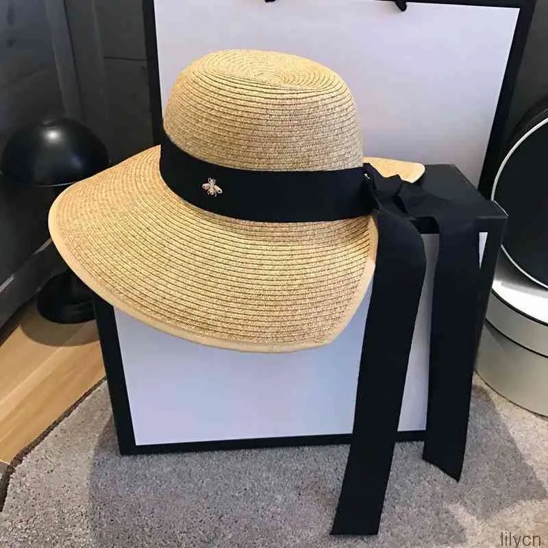 INS Summer Women Straw Hat Fashion Ochrona przed słońcem Osobowość Kapelusze z szerokim rondem ze wstążką dla kobiet na plaży na wakacjach