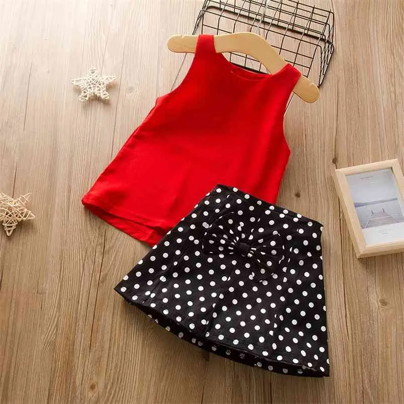 Été Enfants Ensembles Mode Sans Manches O Cou Rouge Solide Tops Dot Bow Jupe Casual 2pcs Filles Vêtements 3-11T 210629