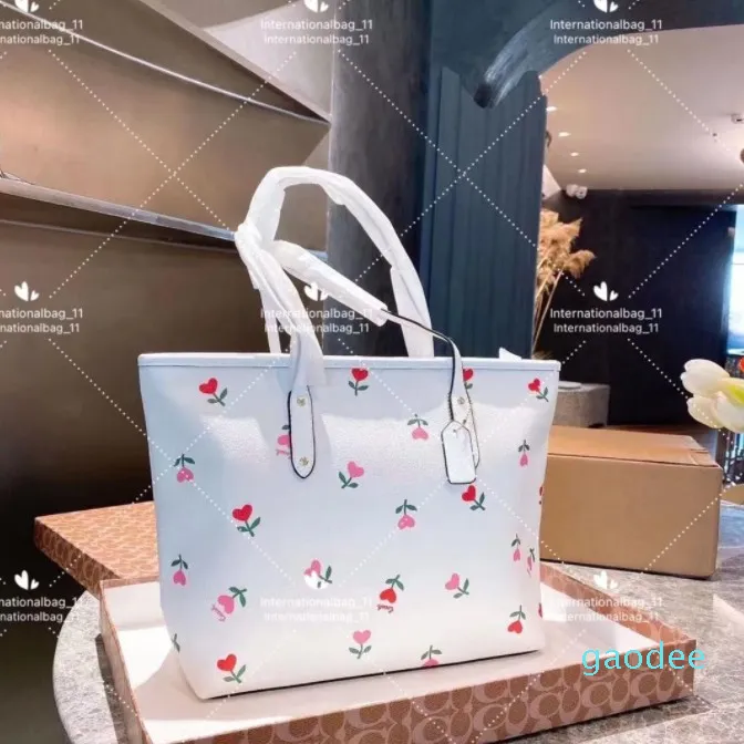 2021 luxe designer femmes sac à provisions de mode classique de grande capacité seule épaule haute qualité tourisme imprimé ordinateur portable fourre-tout cerise