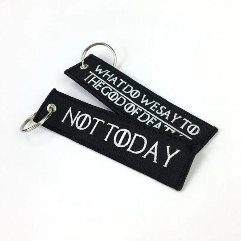 Keychains WHAT DO WE SAY TO THE GOD OF DEATH Keychain For Motorcycles And Cars Embroidery OEM Key Chain Keyring Tags Fashion Llaveros