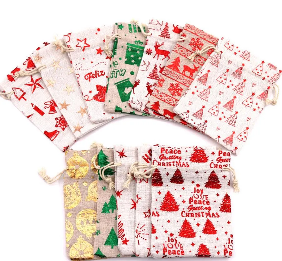 Burlap Väskor Jute Drawstrings Candy Pouch Gift Wrap Metallic Print Jul Treat Bag Olika Designs Holiday Party Decoration Färgglada 2 storlekar