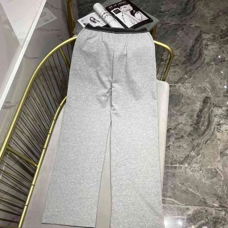 Pantaloni capsula elemento personalizzato posizionamento fettuccia tubo dritto grigio pantaloni a gamba larga