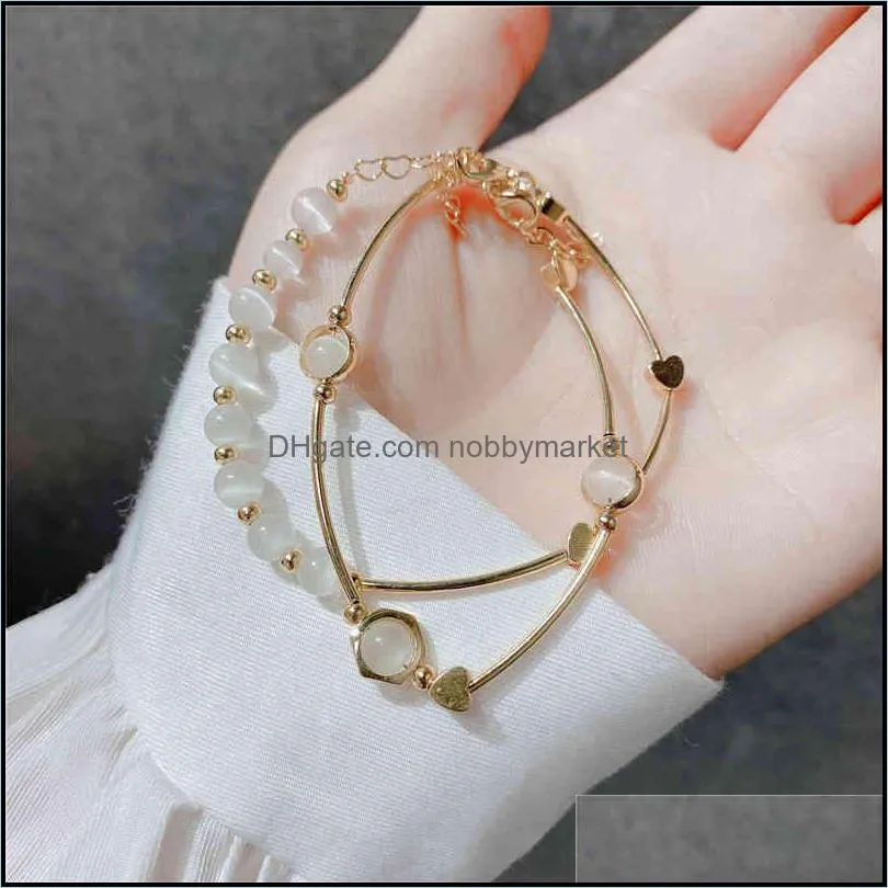 Net red Korean cat`s eye two-piece set temperament overlapping Bracelet female cool wind Beaded Jewelry