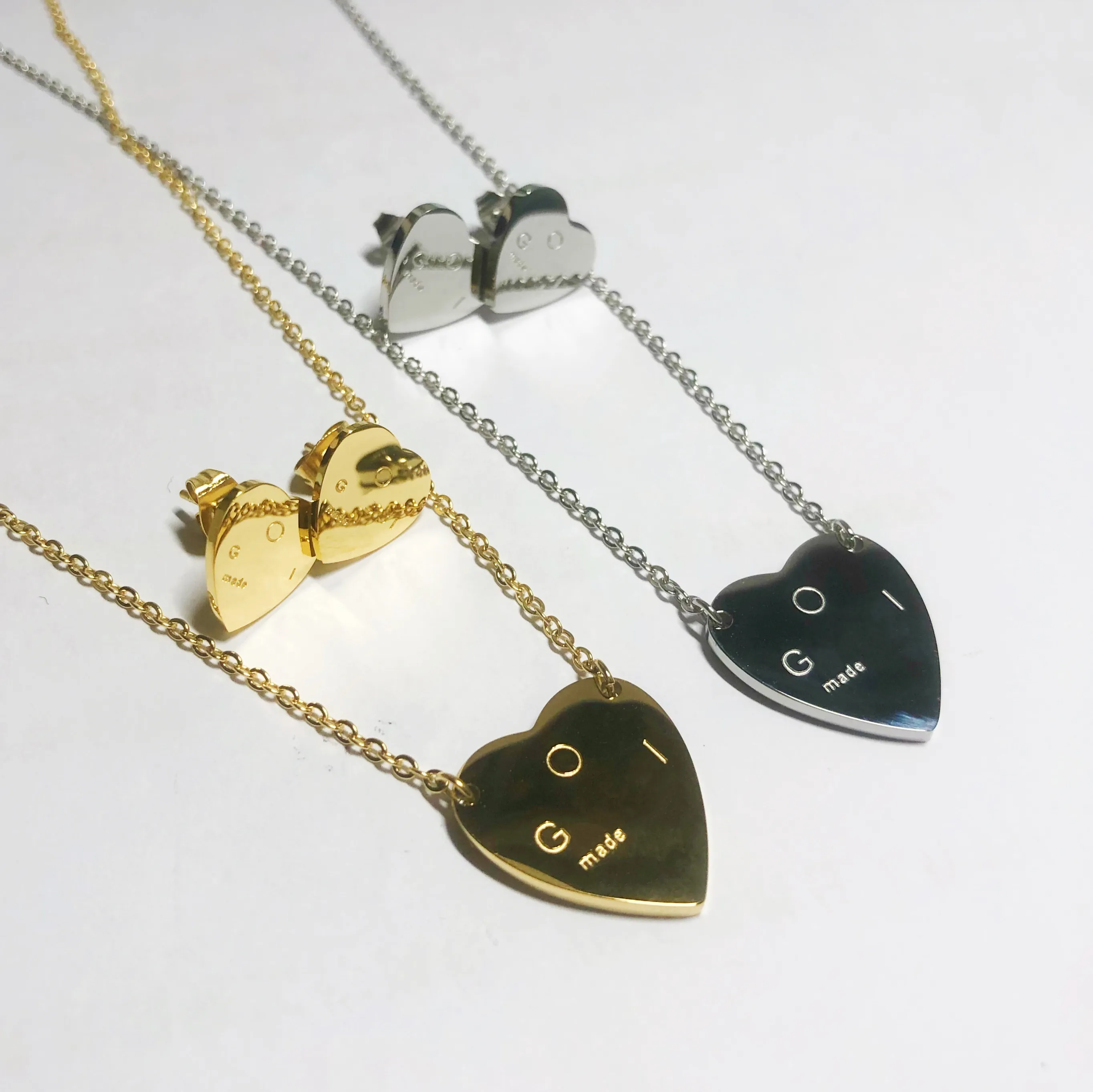 Tasarımcı Takı Kadınlar Kalp Kolye Kolye Gümüş Altın Aşk Küpe Takım Paslanmaz Çelik Saplama Logo Moda Bijoux Kız Ve Kaliteli Yeni Stil