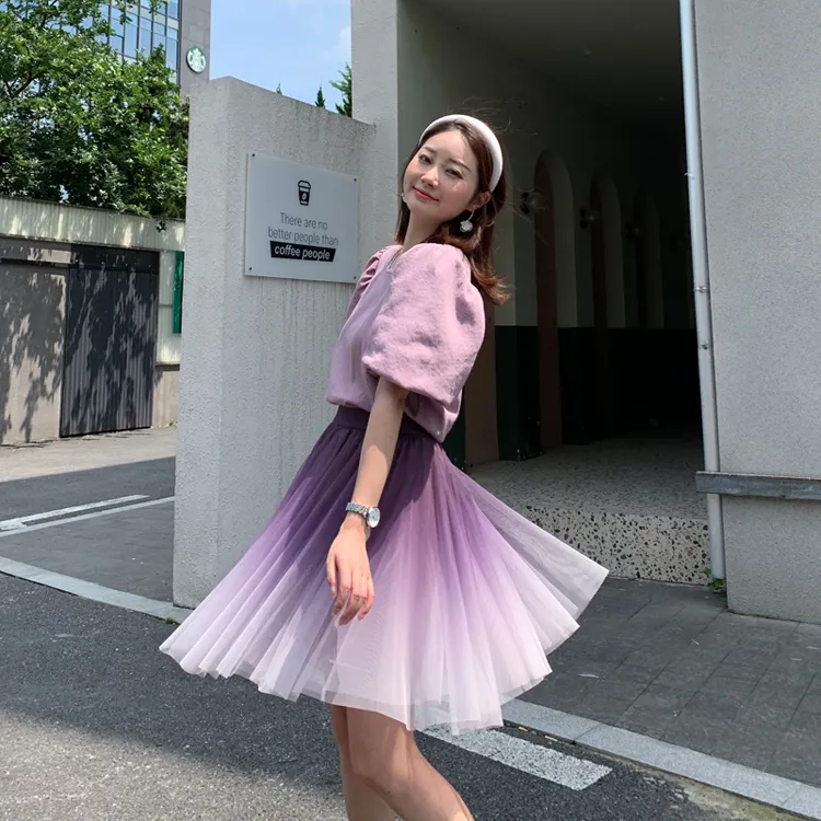 Green pleated skirt yarn top