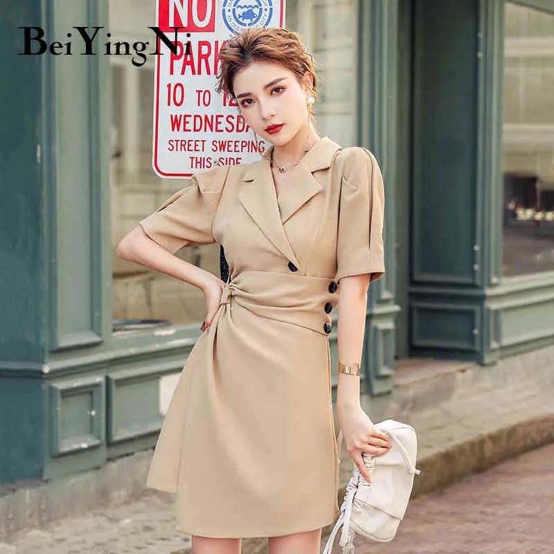 Beiyingni Blazer Robe pour femmes Couleur unie Boutons à manches courtes Asymétrique Mini Costume Robes Bureau Dames Mode Robe décontractée 210416