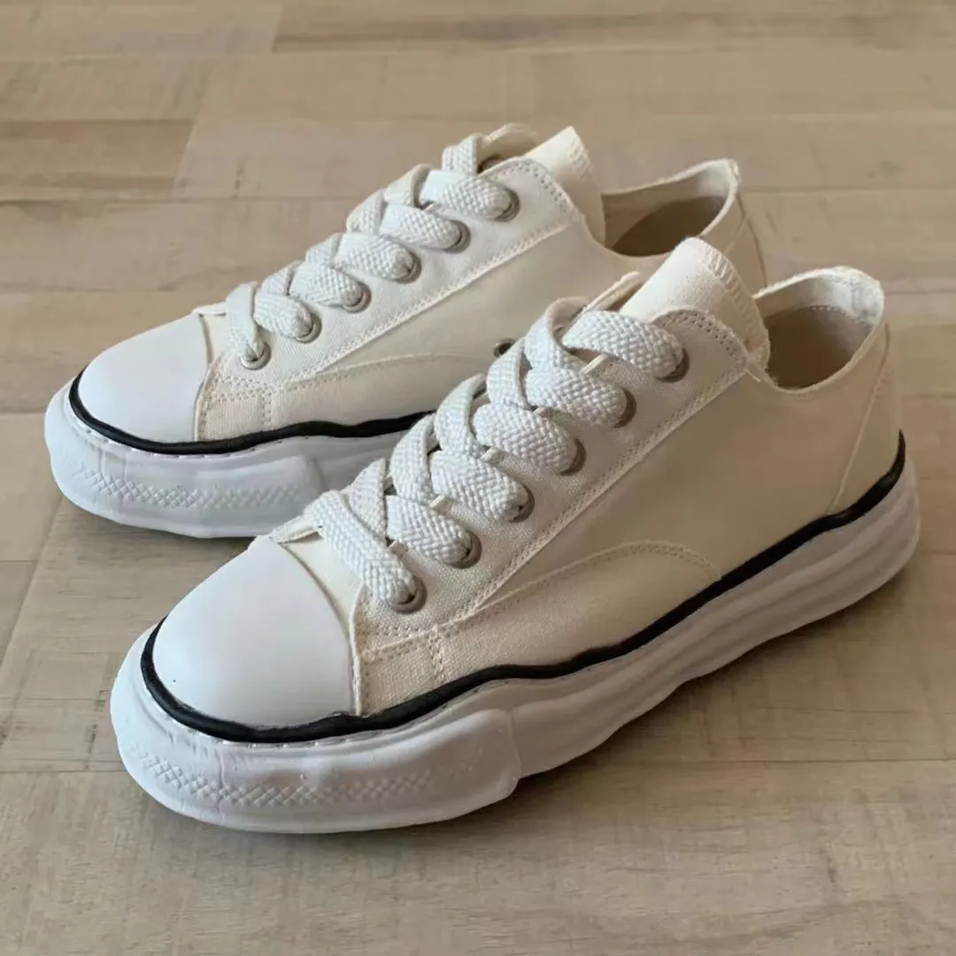 Designer canvas shoes hotsell