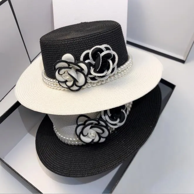 Brands Designer Caps Flower Secchio Cappello per uomo Donne Monted Pearl Hats Wide Brim Checked Astuccio Casual Paglia Erba Braid Sun Estate 56-58cm