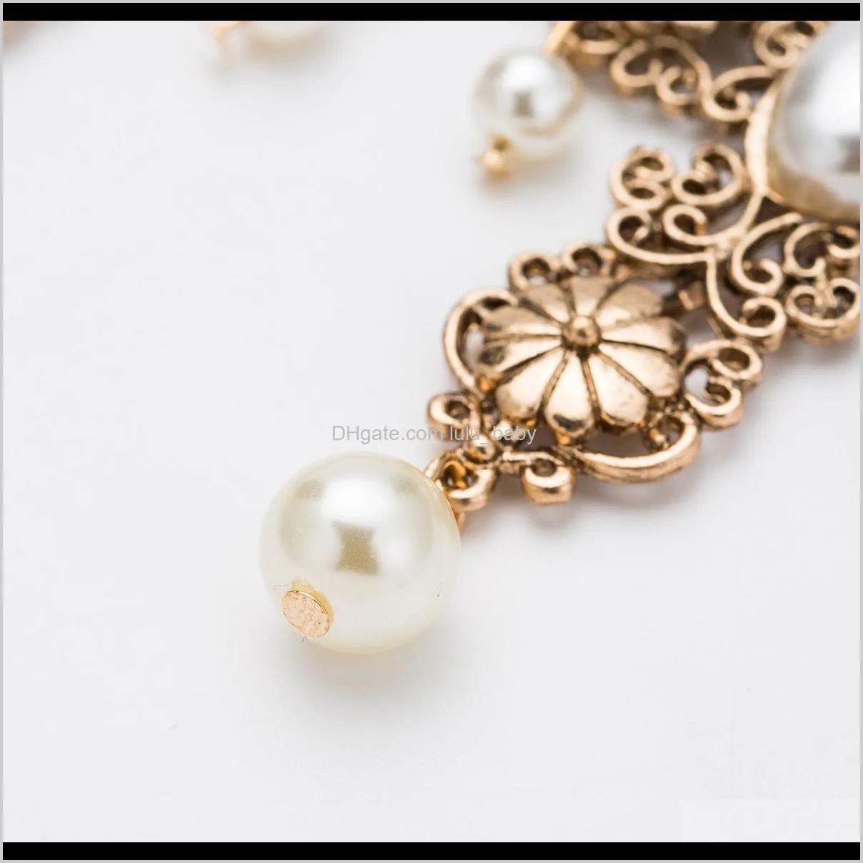 exaggerated alloy cross flower imitation pearl earrings women`s high-end court wind earrings fashion versatile