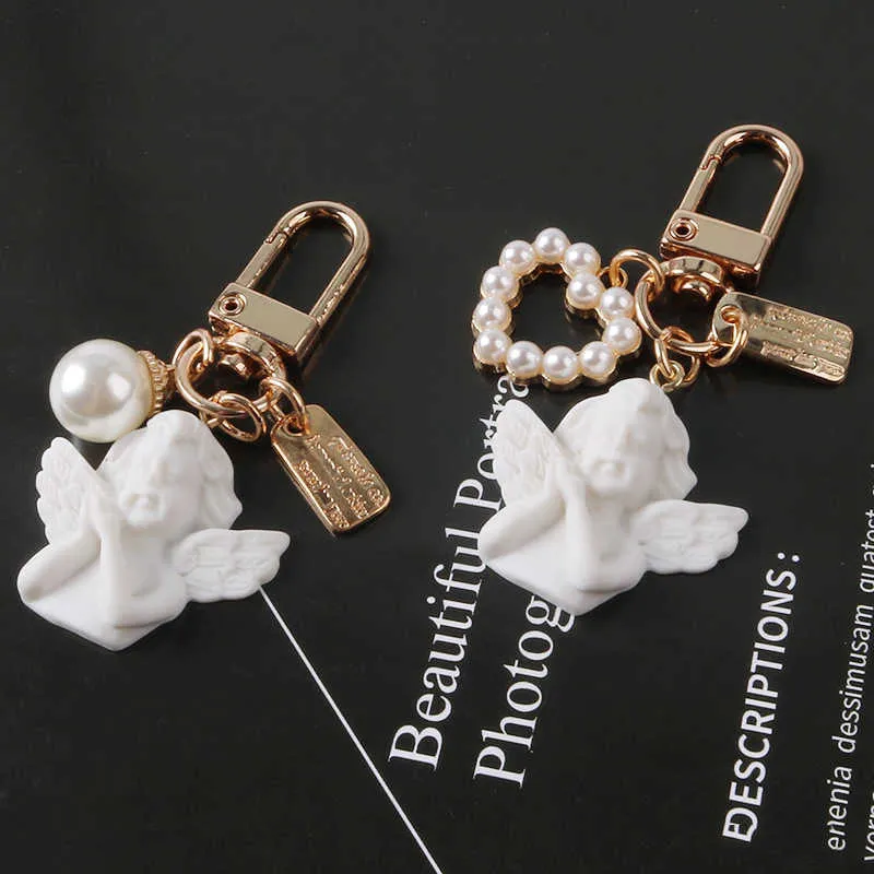 New Keychain Creative Retro Angel Simple Pearl Love Alloy Listing Bag Pendant Decoration Car Key Ring Accessories Holiday Gift G1019