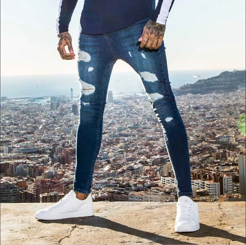 Jeans elastici da uomo Sex Appeal Marchio di moda High Street Strappato Jeans skinny da uomo in cotone da cowboy Jeans da moto di alta qualità X0621