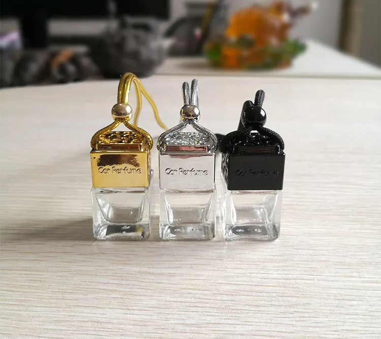 Garrafa de perfume para carro Difusor de óleo perfumado Ornamento retrovisor Pendurado Difusor de óleos essenciais Cubo oco Ambientador Fragrância Garrafas de vidro vazias Pingente