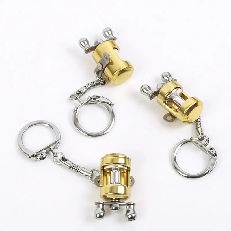 Gold Fish Wheel Gearbox Keychain With Spinning Reel And Key Ring Miniature  Fishing Reels For Fishermen From Dasilva, $4.74