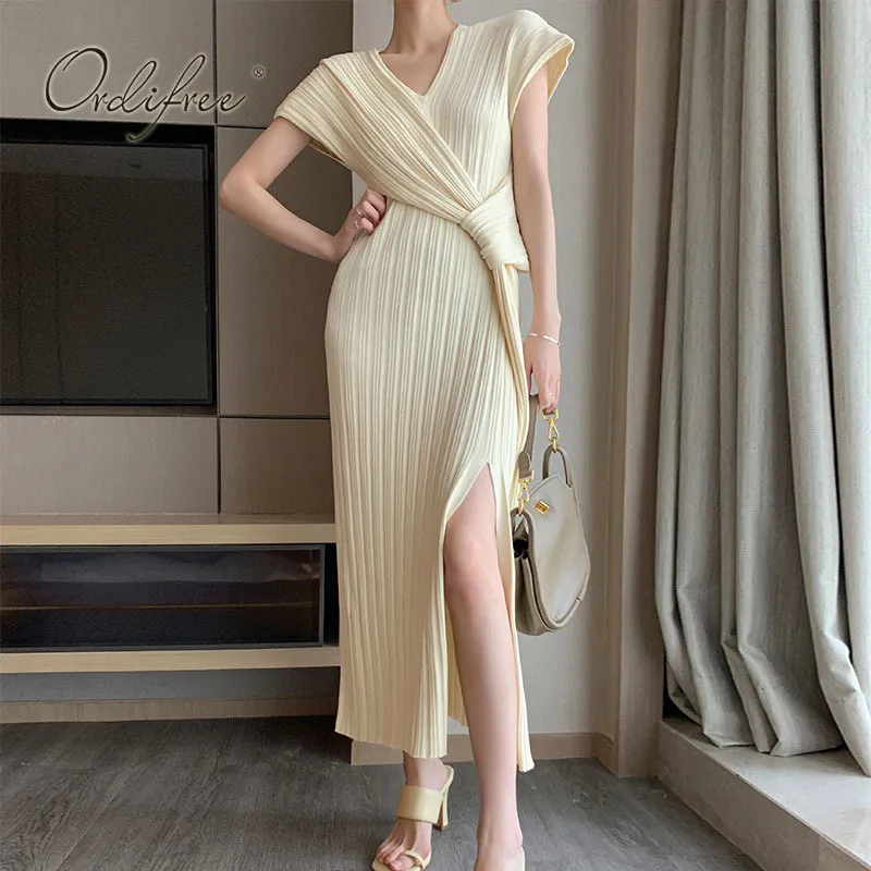 Höst lyxiga kvinnor stickade lång sexig designer vintage split tröja klänning 210415