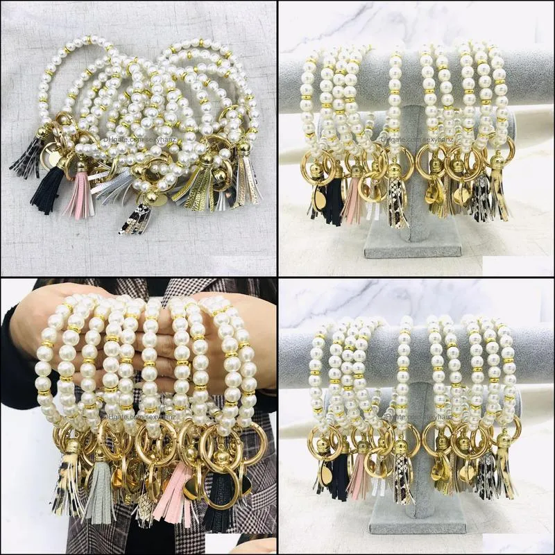 Best Seller Elegant Personalized Metal Disc Charm Pearl Bangle Keyring Handmade Fashionable Faux Pearl Leather Tassel Bracelet