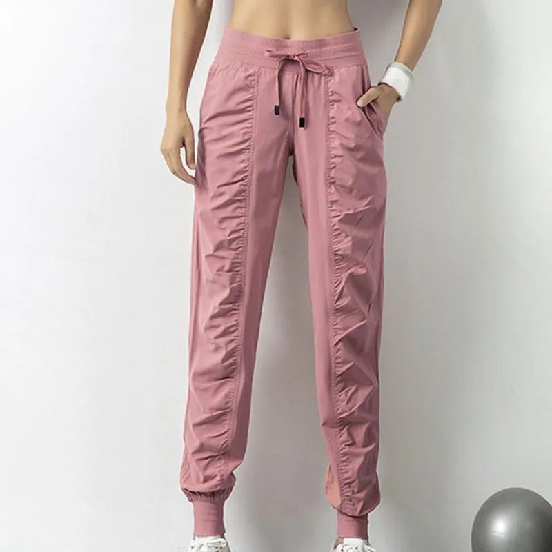 Womens Quick Dry Tatting Fabric Drawstring Running Capris With Two Side  Pockets Athletic Fitness Joggers And Yoga Sweatpants From Lizhirou, $17.69