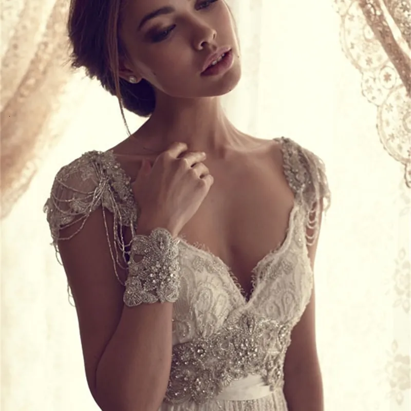 Mode Cap manches perles dentelle une ligne longueur de plancher robes de mariée pour la mariée