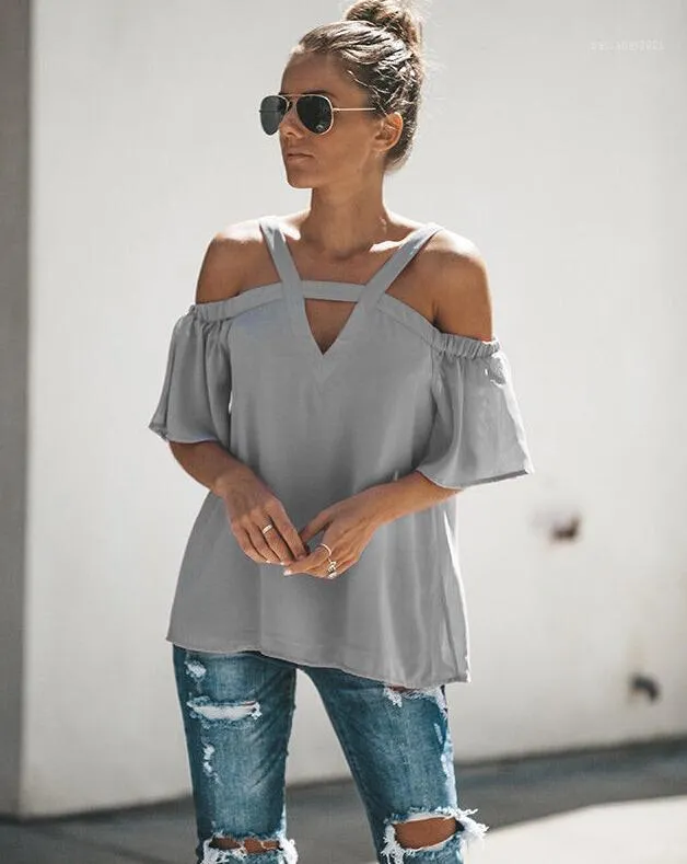 女性のブラウスシャツファッション冷たい肩の半袖シャツプルオーバースパゲッティストラップトップスブラウスカジュアル服衣装