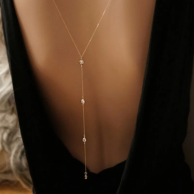 Kvinnor långa halsband kropp sexiga nakna bakkedjor guldkristall rhinestone hänge bakgrundsstrand smycken