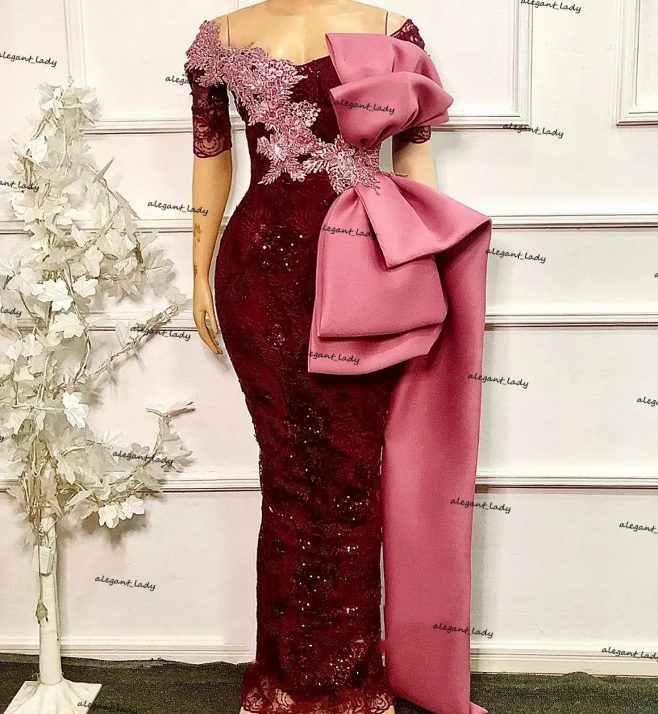 Eleganta afrikanska korta ärmar sjöjungfrun kvällsklänningar 2021 av axel spets beaded burgundy big bow prom kappor robe de soiree