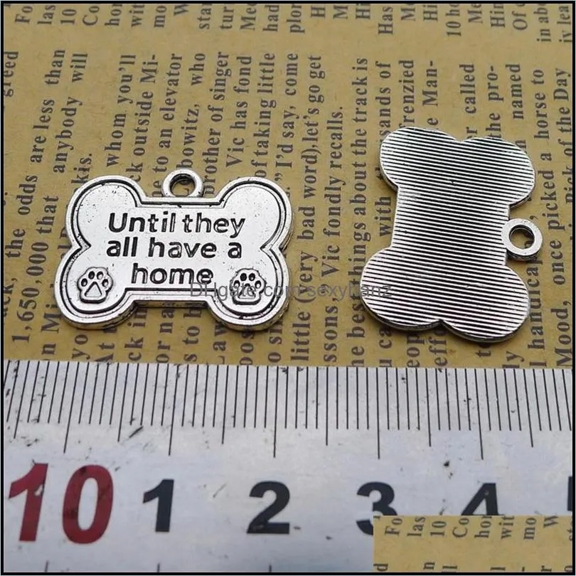 Wholesale Alloy Dog Bone Shape Charms Until They All Have A Home Dog Paw Print Charms 20*25mm 50pcs AAC974 148 W2