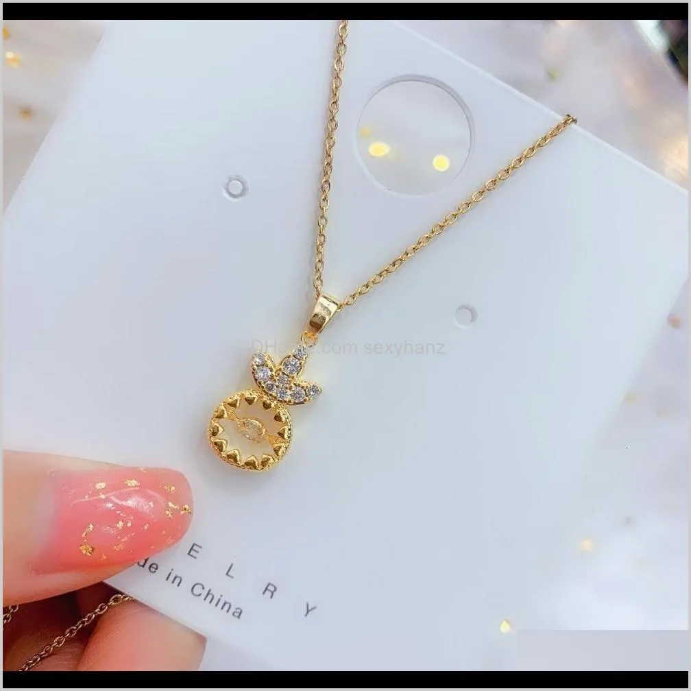 pendant real gold color and copper micro inlaid round diamond four claw beating heart flower crown temperament women`s trendy clavicle